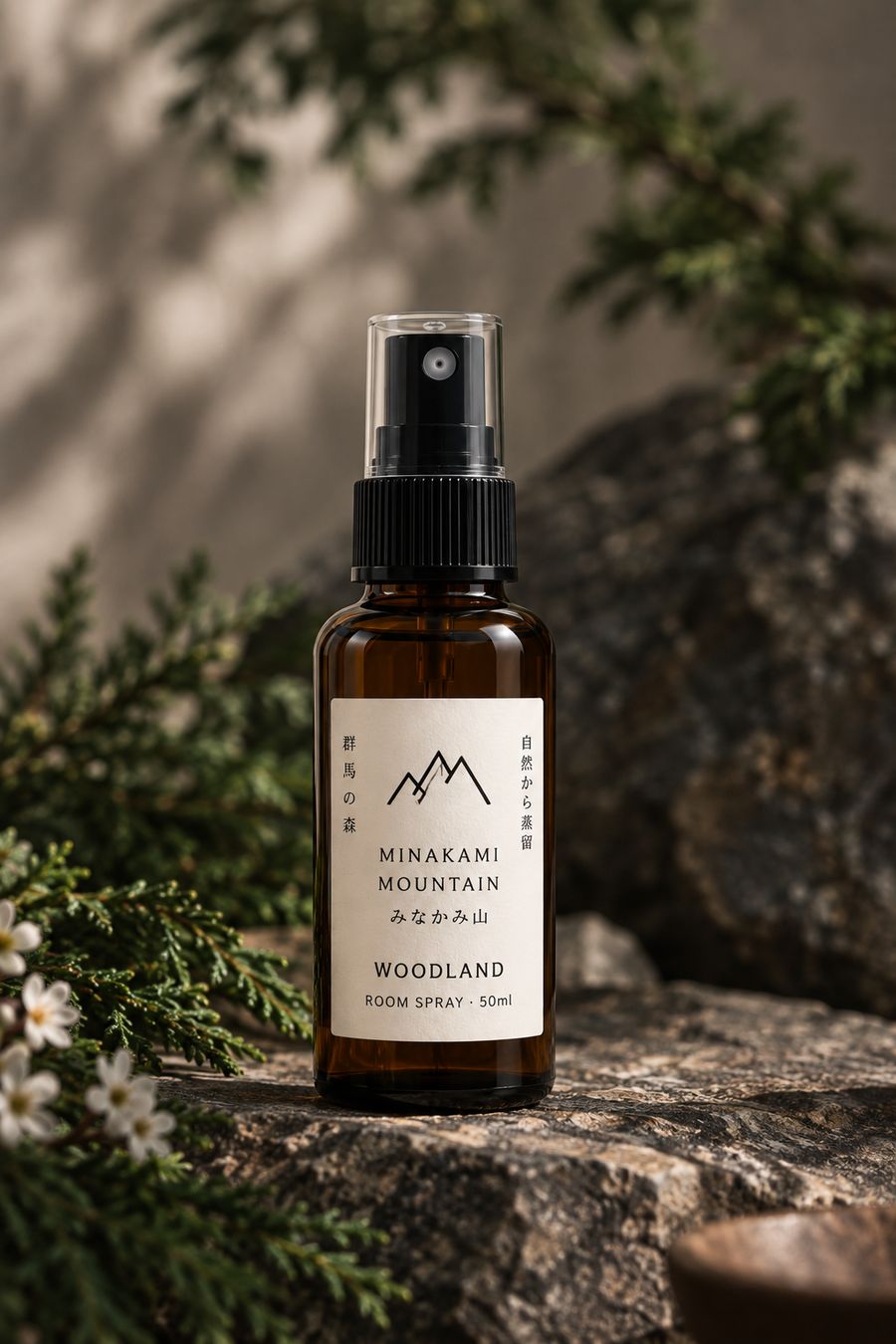 Woodland 50ml room spray on a forest rock
